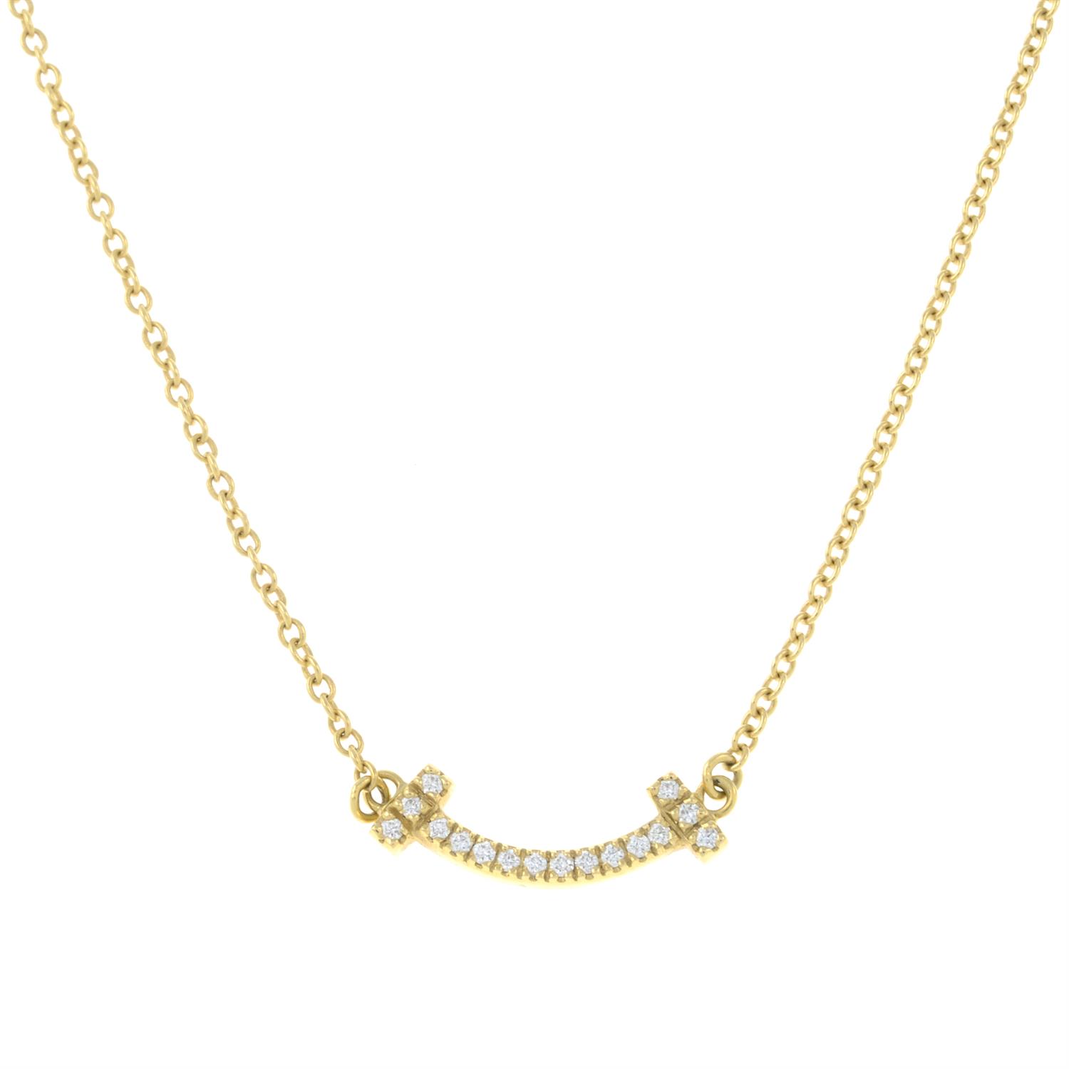 A pave-set diamond 'Tiffany T' Smile pendant, with chain, by Tiffany & Co.