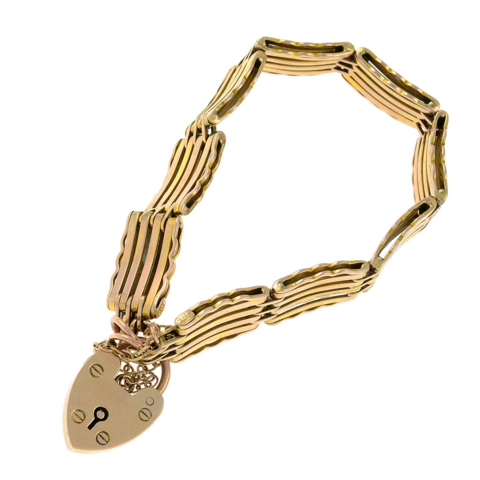 A bracelet, with heart-shape padlock clasp.