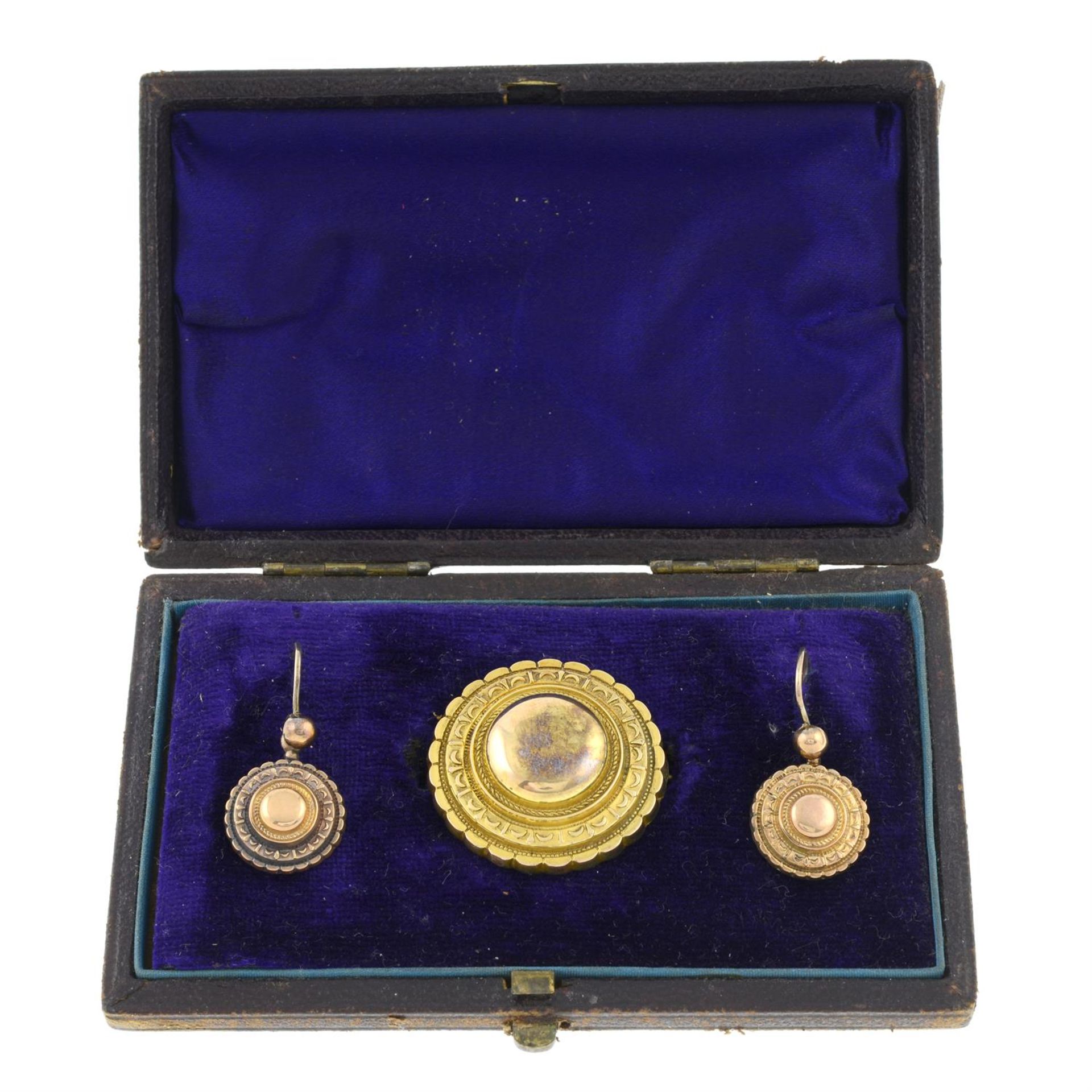 A 19th century jewellery set, to include a brooch, together with a pair of earrings.
