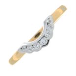 An 18ct gold brilliant-cut diamond shaped half eternity ring.