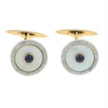 A pair of 15ct gold sapphire and mother-of- pearl cufflinks.