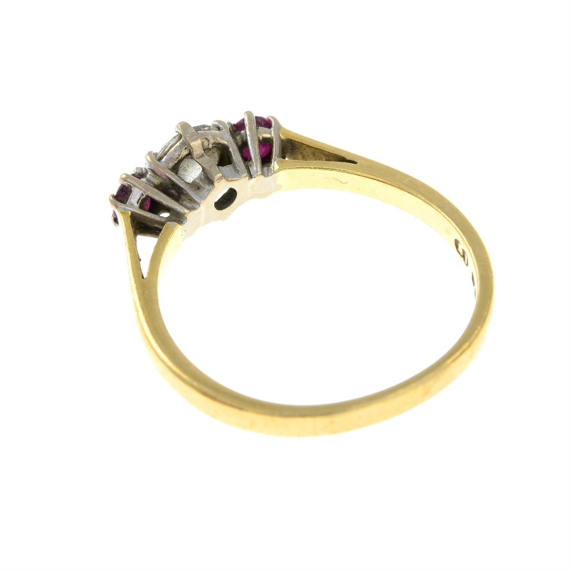 An 18ct gold brilliant-cut diamond and ruby three-stone ring. - Bild 2 aus 2