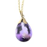 An amethyst pendant, with chain.