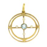 An early 20th century 15ct gold aquamarine and seed pearl pendant.