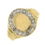 A 9ct gold pave-set diamond signet ring.