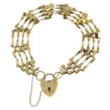 A 9ct gold bracelet, with heart-shape padlock clasp.