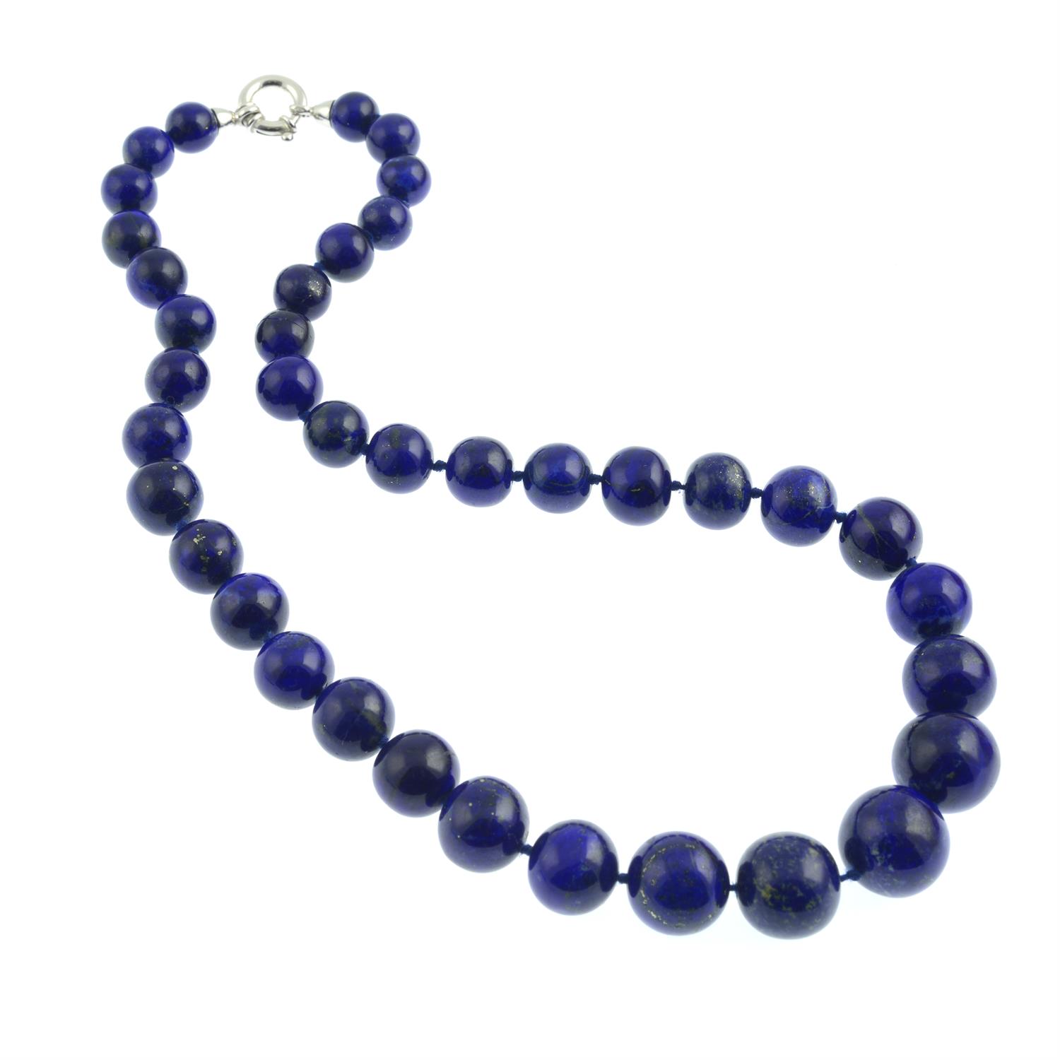 A graduated lapis lazuli bead necklace.
