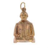 An early 20th century gold Shakespeare bust pendant / charm.