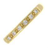 An 18ct gold pave-set diamond half eternity ring.