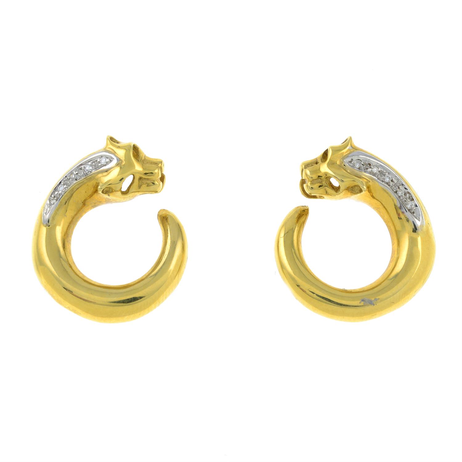 A pair of diamond panther hoop earrings.