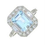 An aquamarine and vari-cut diamond cluster ring.