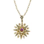 An early 20th century gold, ruby and split pearl star pendant, with similarly aged seed pearl chain.