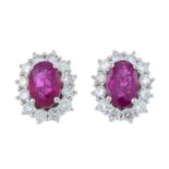 A pair of 18ct gold ruby and brilliant-cut diamond cluster earrings.