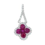 An 18ct gold ruby and brilliant-cut diamond cluster pendant.