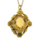 A mid 19th century gold citrine floral pendant, with a similar age 9ct gold chain.