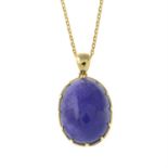 A tanzanite pendant, suspended from a chain.