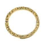 A Georgian 9ct gold floral engraved split ring.