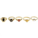 Five 9ct gold gem-set single-stone rings.