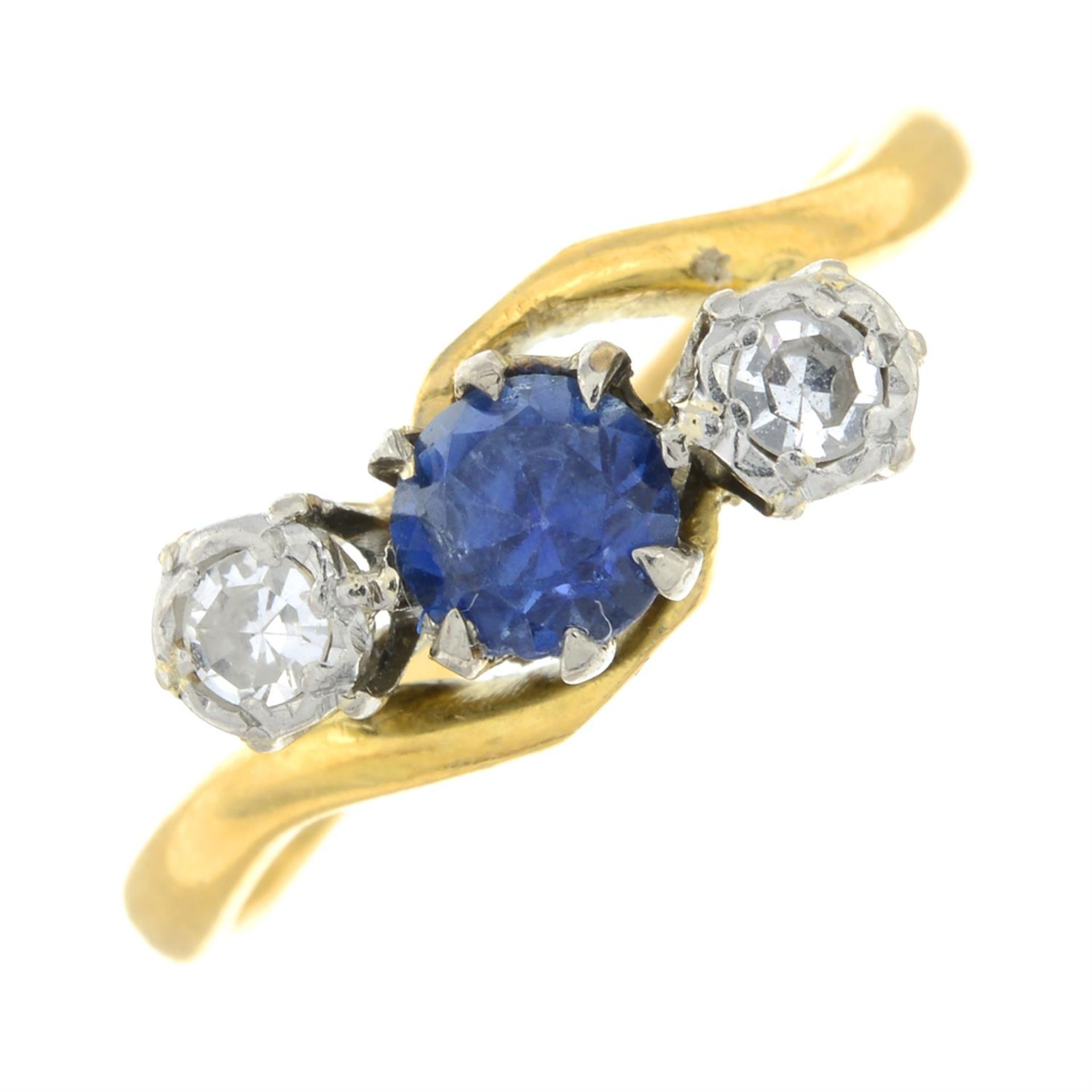 A mid 20th century 18ct gold and platinum, sapphire and diamond three-stone ring.