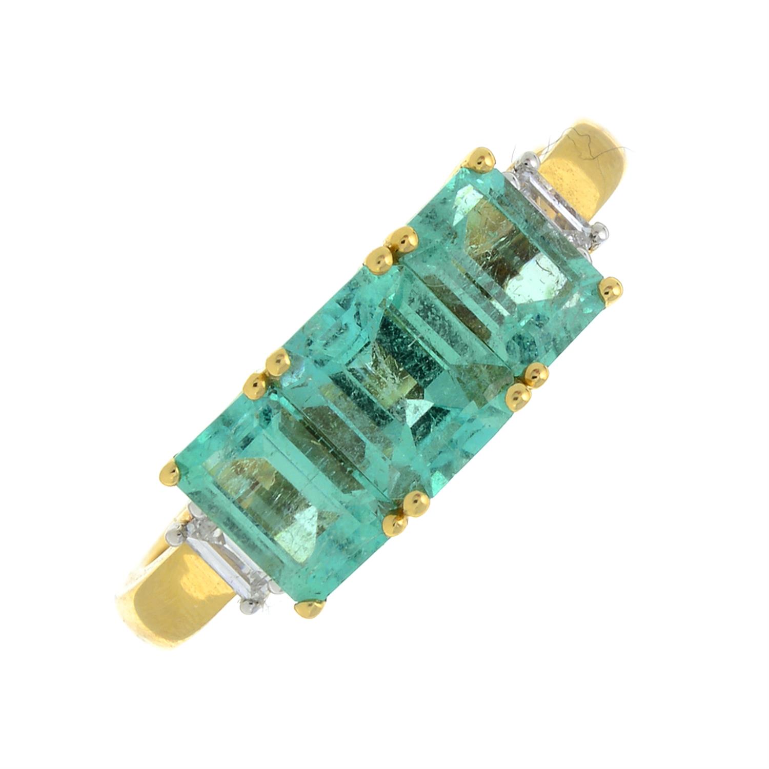 An 18ct gold Colombian emerald and diamond ring.