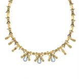 A 14ct gold blue topaz necklace.