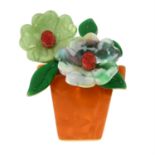 A plastic flower pot brooch by, Lea Stein.