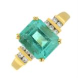 An 18ct gold Colombian emerald single-stone ring, with diamond shoulders.