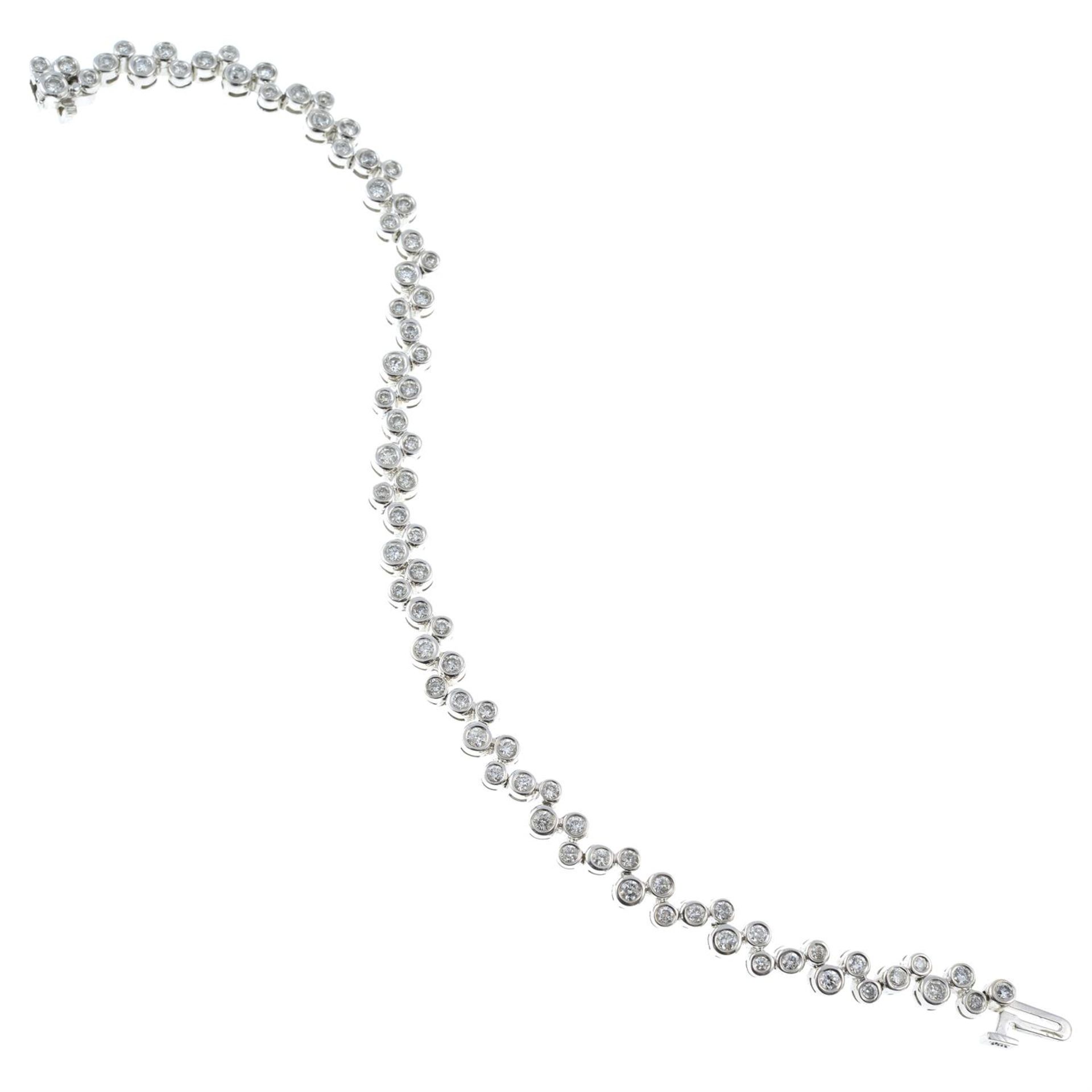 A brilliant-cut diamond collet bracelet. - Image 2 of 3