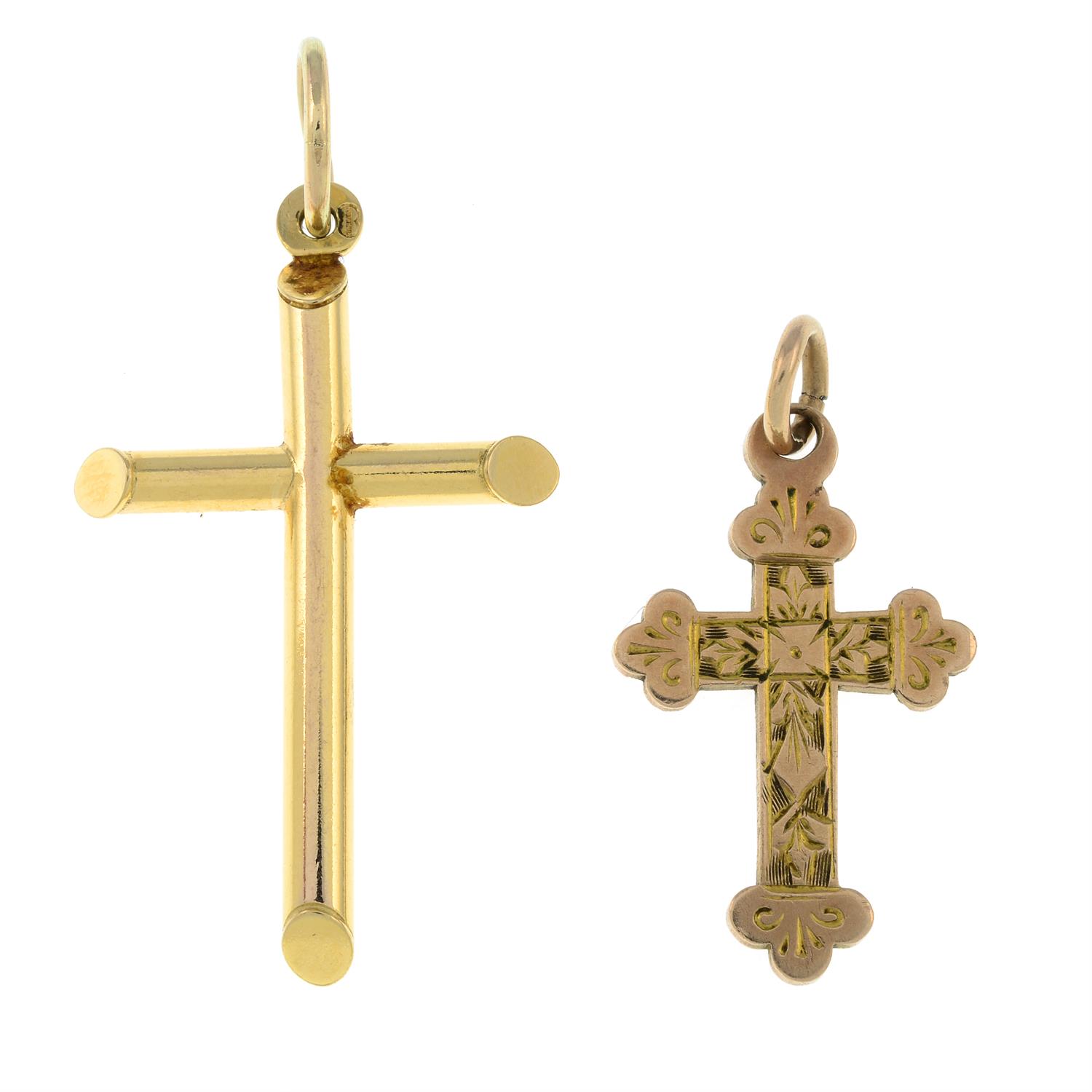 Two cross pendants.