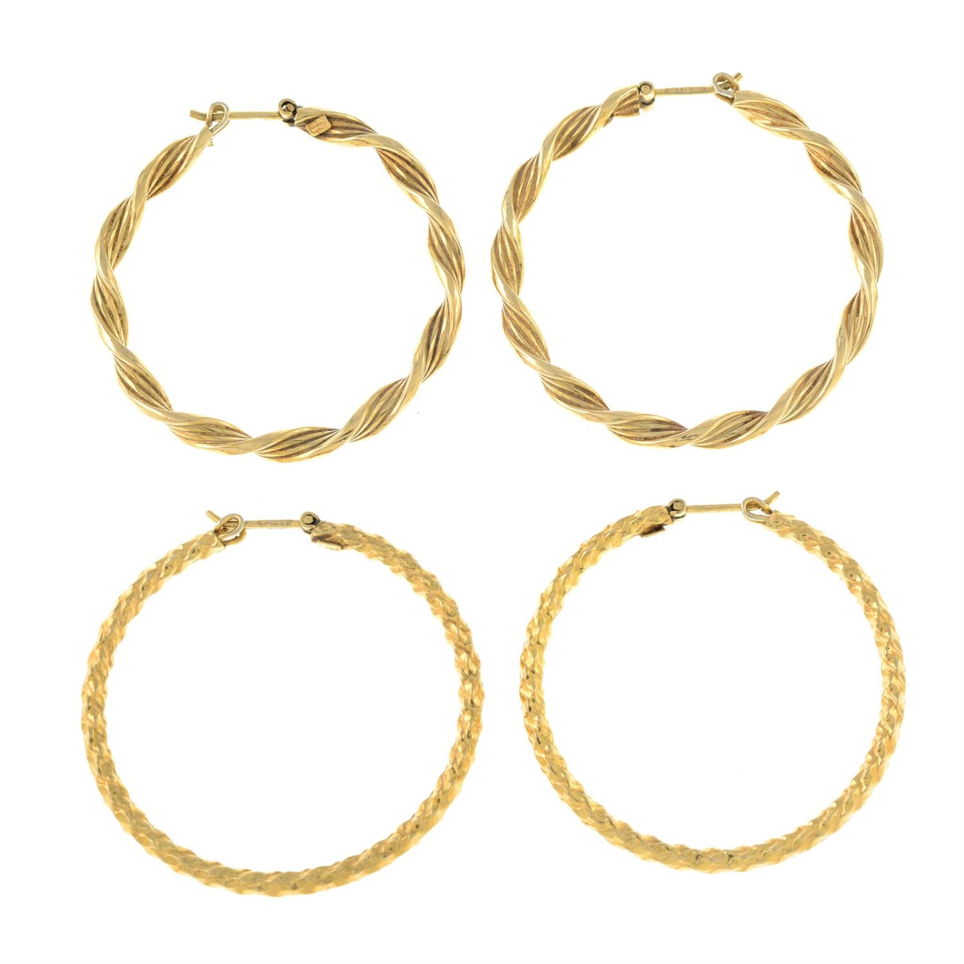 Two pairs of 9ct gold hoop earrings.