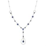 A sapphire and diamond necklace.