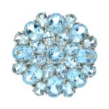 A topaz cluster dress ring.