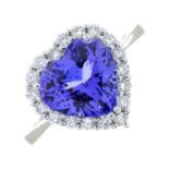 An 18ct gold tanzanite and diamond heart-shape cluster ring.