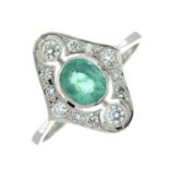 An emerald and diamond dress ring.