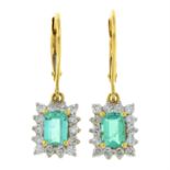 A pair of 18ct gold Colombian emerald and diamond cluster earrings.