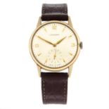 LONGINES - a 9ct yellow gold wrist watch, 33mm.