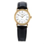 LONGINES - a 9ct yellow gold Presence wrist watch, 21mm.