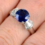 A sapphire and tapered baguette-cut diamond ring.