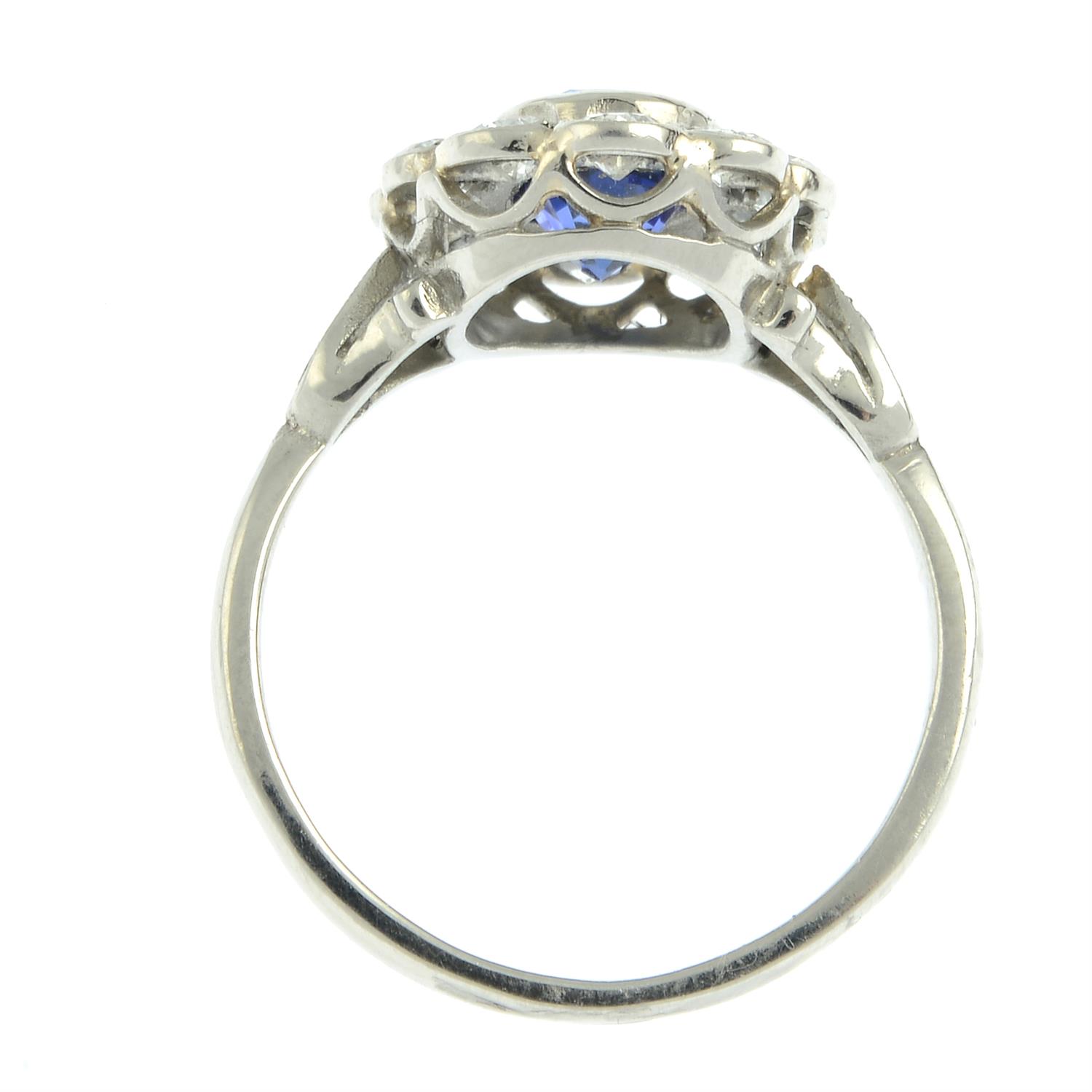 A platinum sapphire and old-cut diamond floral cluster ring. - Image 5 of 6