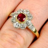 An 18ct gold ruby and circular-cut diamond floral cluster ring.