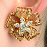 A pair of mid-20th century 18ct gold, vari-cut diamond floral earrings, with pieced lattice ribbon