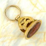 A 19th century 9ct gold acorn and oak leaf accent fob, the carnelian engraved with a huntsman on