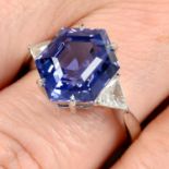 A Sri Lankan sapphire and triangular-shape diamond ring.