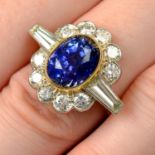 An 18ct gold Sri Lankan sapphire and diamond cluster ring.