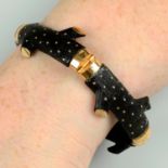A mid to late 19th century, 18ct gold pressed horn bracelet, the links modelled as sections of a