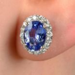 A pair of sapphire and brilliant-cut diamond cluster stud earrings.