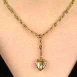 A late Victorian gold fancy-link necklace, suspending a scrolling heart.