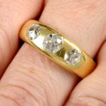 A late Victorian 18ct gold graduated old-cut diamond three-stone tapered band ring.