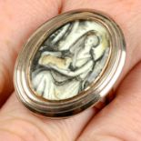 A Georgian morning ring depicting a lady cradling a lamb.