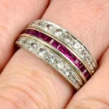 A synthetic sapphire, synthetic ruby and colourless paste hinged eternity ring.